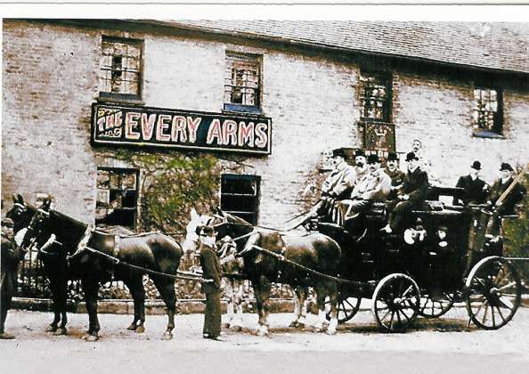 Horse drawn carriage outside the pub