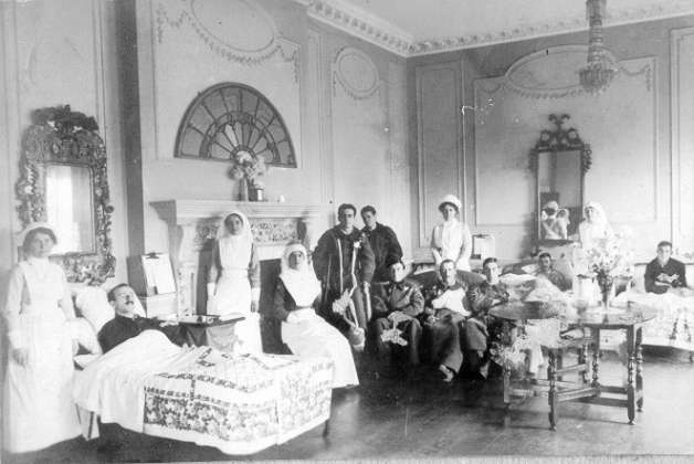 Black and white photo of nurses and patients